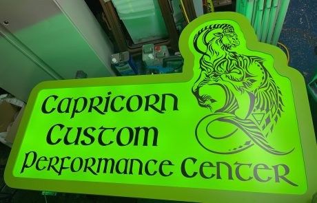 Indoor signage that reads Capricorn Custom Performance Center