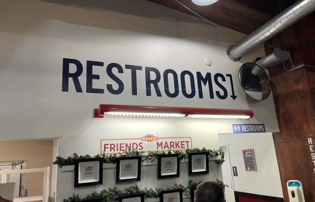 Indoor Restaurant Signage for a restroom at Friends Market