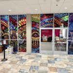 Indoor Environmental Sign that is multicolored similar to a stained glass window