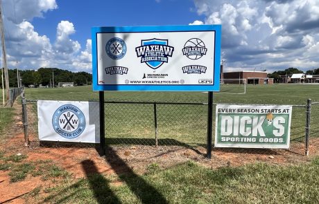Sports Complex Sign for Waxhaw Athletic Association next to a sign for Dick's Sporting Goods