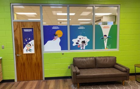 Indoor window signage, Blue Background with white letters, Occupational, Physical, Speech, and Behavior Therapy