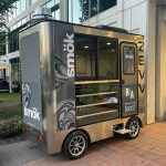 Metallic Grey Custom Vehicle Graphic for a Fleet Trailer Wrap that read Smok.