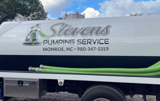 vehicle wraps Charlotte NC, custom truck lettering and vinyl graphics on Stevens Pumping Service tanker truck